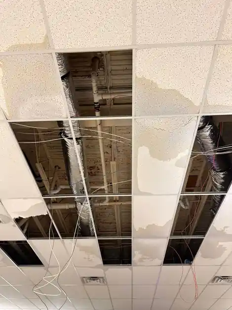 Drop ceiling opened with the panels removed